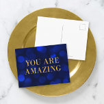 Cartão Postal Sapphire Blue Bokeers Luzes Douradas Você É Incrív<br><div class="desc">Cartão postal motivacional chic com as palavras "Você é incrível" em folha de ouro falsa contra um padrão de luz azul-sapphire. Para adicionar texto ao cartão, clique no botão "Personalizar". *Observe que a Marca d'água do Zazzle que aparece na visualização de zoom NÃO aparecerá no produto impresso final. © Rosewood...</div>