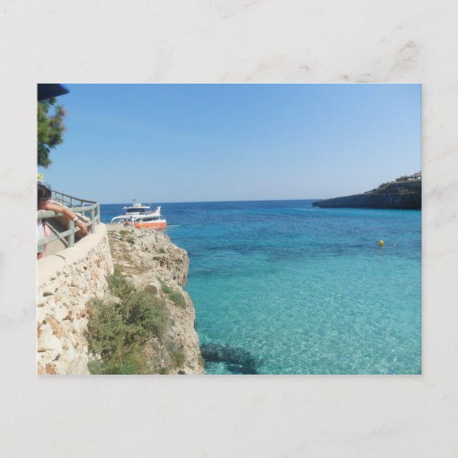 Cartão Postal Sol, mar e um pequeno barco laranja (Frente)