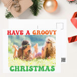 Cartão Postal Tenha uma foto de hippie de Natal em Groovy<br><div class="desc">Tenham um Natal agradável. Personalize o seu cartão postal de feriado hippie com este texto engraçado dos anos 70 em cores divertidas. Um cartão postal de Natal hippie colorido com sua foto de família.</div>