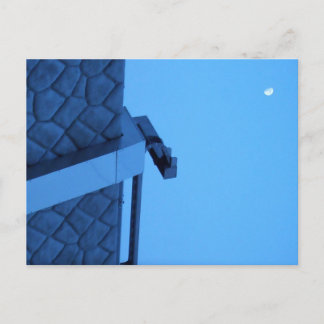 Cartão Postal The moon hangs above the breakwater.