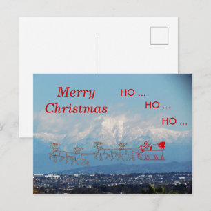 Cartão postal – Trenó e Papai Noel sobre o SoCal