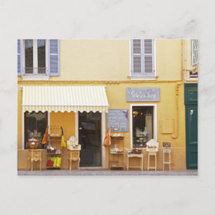 Cartão Postal Uma rua de mercado na velha cidade com um compro