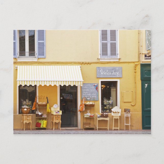 Cartão Postal Uma rua de mercado na velha cidade com um compro (Frente)