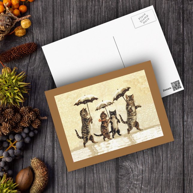 Cartão Postal Vintage Cats Umbrellas Snow (Four cats walking upright with umbrellas in snow on yellow with brown border postcard.)