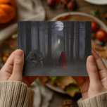 Cartão Postal Werewolf Little Red Riding Hood Spooky<br><div class="desc">Este design pode ser personalizado escolhendo a opção personalizar para adicionar texto. Entre em contato comigo em colorflowcreations@gmail.com se você quiser usar este design em outro produto. Compre minha pintura de acrílico abstrato original para venda em www.etsy.com/shop/colorflowart. Veja mais das minhas criações ou siga-me em www.facebook.com/colorflowcreations, www.instagram.com/colorflowcreations, www.twitter.com/colorflowart e www.pinterest.com/colorflowcreations....</div>