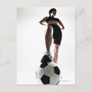 Cartão Postal young woman training,football