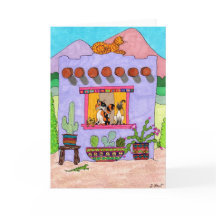 Quatro gatos em uma Adobe House roxa