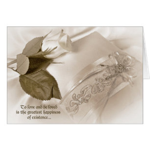 Cartão rosa branca no travesseiro do casamento