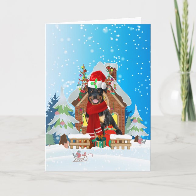 Cartão Rottweiler na neve com presentes de Natal (Frente)