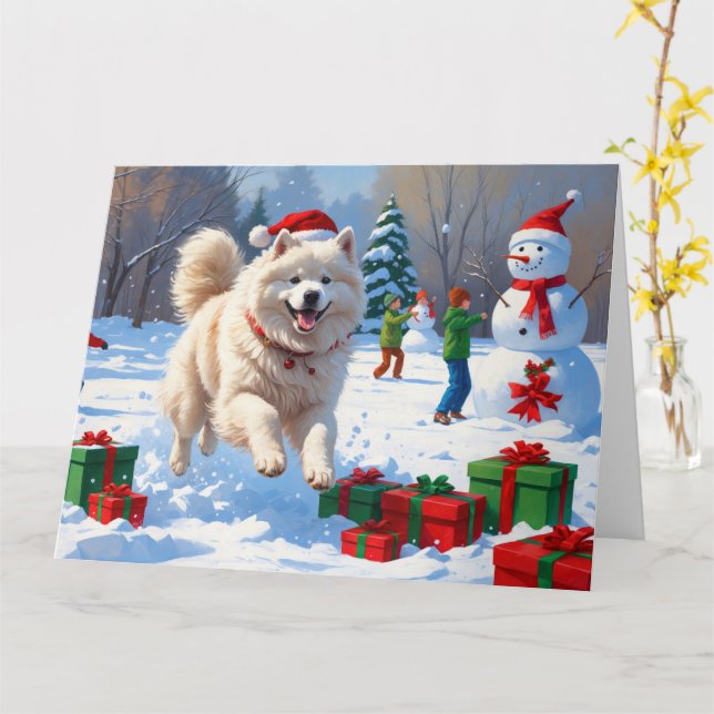 Cartão Samoyed Correndo na Neve com Chapéu de Natal (Flor Amarela)