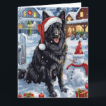 Cartão Shepherd Dog Winter Wonderland Christmas<br><div class="desc">seu design festivo captura o espírito alegre da época de férias, apresentando um adorável filhote vestindo um chapéu de Papai Noel. O cachorro está aninhado numa terra maravilhosa de inverno, completo com um boneco de neve, uma árvore de Natal decorada, e presentes lindamente envoltos. Os flocos de neve caem suavemente,...</div>