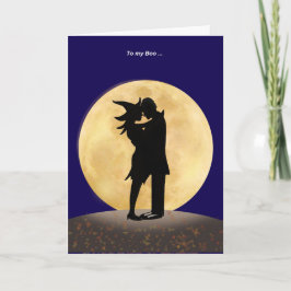 Cartão Silhouette of a Witch and Vampire embracing