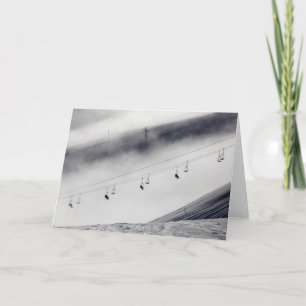 Cartão Skiers on a chair lift