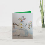 Cartão snowman greeting card<br><div class="desc">An original watercolor with a snowman,  flower crowns and chickadees printed on the front of this greeting card,  inside the background color is green.  A great card to cheer someone,  or just to say hello.  Also could be nice for Christmas.  painting by Kristina Anderson</div>