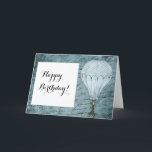 Cartão Steampunk Hot Air Balloon Dusk Blue Handwriting<br><div class="desc">Matches other Steampunk hot air balloon design items such as cards and wrapping paper. Great for aviators and other air travel fans. This design features a Victorian Steampunk Hot Air Balloon gently flying in front of a scrapbook background page filled with handwriting washed with shades of soft, dusk blue. This...</div>