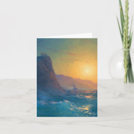 Cartão Steep rocky coast and a rough sea at sunset