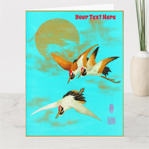 Cartão Três guindastes sarus voando em frente à lua