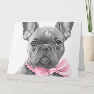 Cartão Um cachorrinho francês adorável com um arco rosa