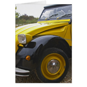 Cartão Um velho Citroen 2CV 2 CV preto e amarelo,