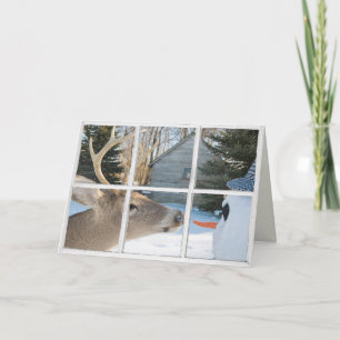 Cartão Veado de Natal e boneco de neve na janela