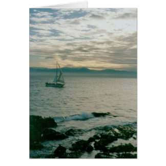 Cartão Vela da noite do inverno na Costa do Pacífico