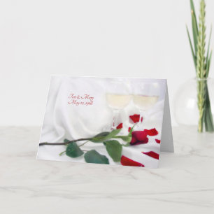 Cartão vinho do aniversário de casamento e rosa no satin