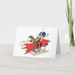 Cartão Wile E. Coyote lançando o foguete vermelho