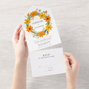 Casamento por terra das flores selvagens laranja e