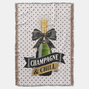 Champanhe e cobertor de derrame