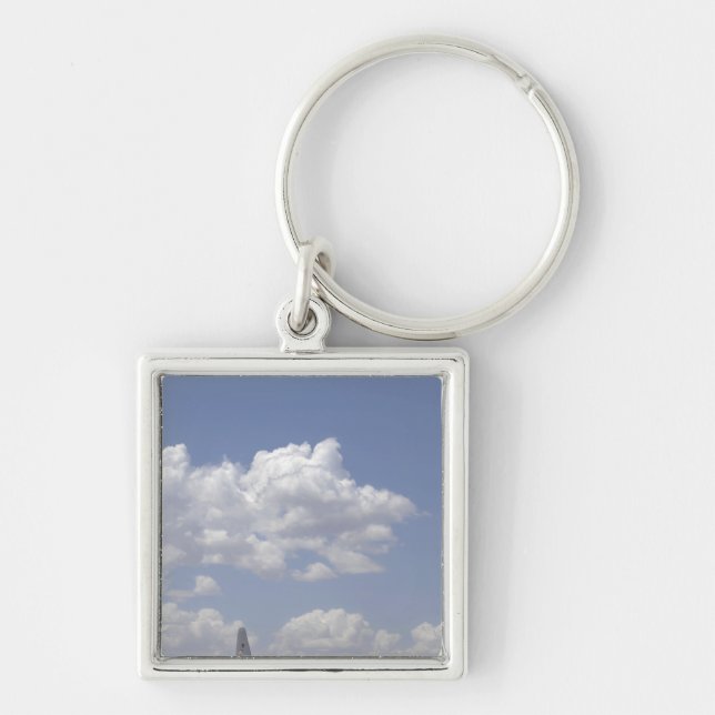 Chaveiro A CV- 22 Osprey voa sobre um Hércules C- 130 (Frente)