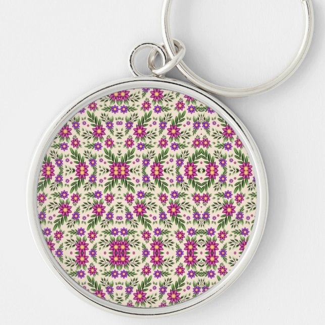 Chaveiro A round keychain features a detailed floral  (Frente)