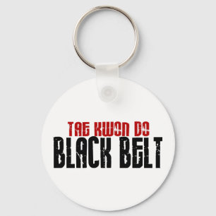 Chaveiro A TAI Kwan faz o karaté do cinturão negro