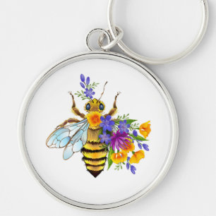 Chaveiro Abeja flor com plantas silvestres