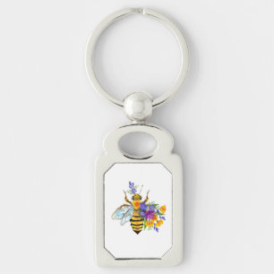 Chaveiro Abeja flor com plantas silvestres