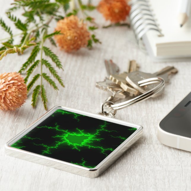 Chaveiro Alienígena - Luzes verdes no escuro como breu (Lateral)