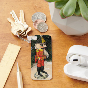 Chaveiro Aparador de Nozes Antigo sob a Árvore de Natal