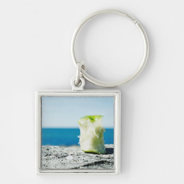 Chaveiro Apple retira o núcleo na sujeira (Frente)