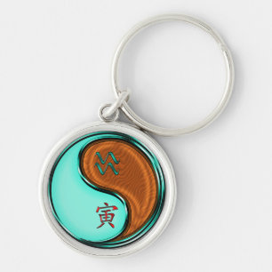 Chaveiro Aquarius e Wood Tiger