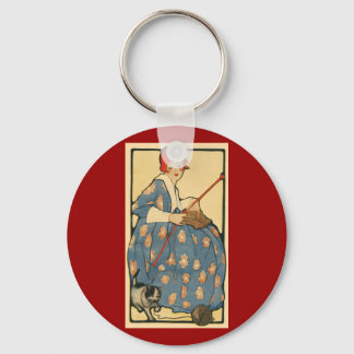 Chaveiro Art Nouveau - Rapariga tricotando com seu gato