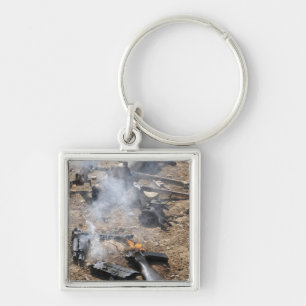 Chaveiro As partes das armas inimigas apresentam para