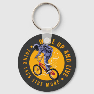 Chaveiro Astronauta BMX andando de bicicleta