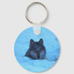 Chaveiro azul do lobo de madeira da neve