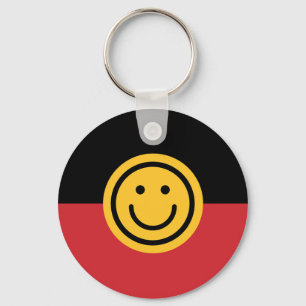 Chaveiro Bandeira aborígene australiana com rosto de sorris