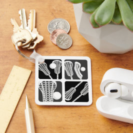 Chaveiro Blocos pretos de lacrosse com palitos e bolas