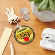 Bola de boliche e pinos com a palavra STRIKEOLOGIS