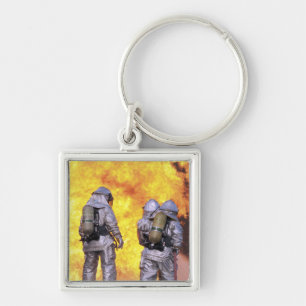 Chaveiro Bombeiros extinguem incêndio aéreo