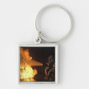 Chaveiro Bombeiros extinguem uma pilha simulada