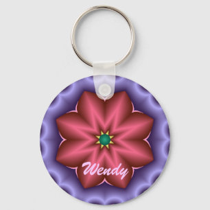 Chaveiro bonito com flor e nome da fantasia