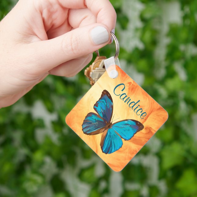 Chaveiro Borboleta colorida azul tropical e gema turquesa (Mão)