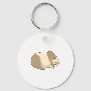 Chaveiro bronzeado bonito e hamster branco